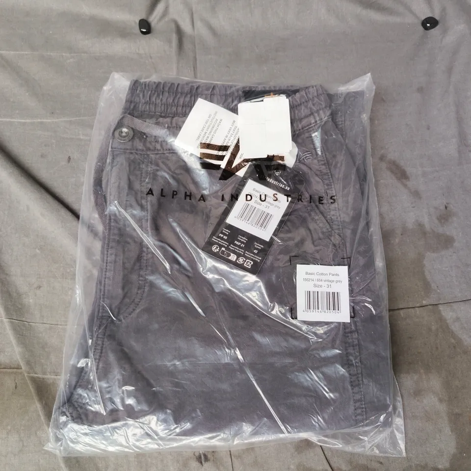 BAGGED ALPHA INDUSTRIES BASIC COTTON PANTS IN VINTAGE GREY SIZE 31