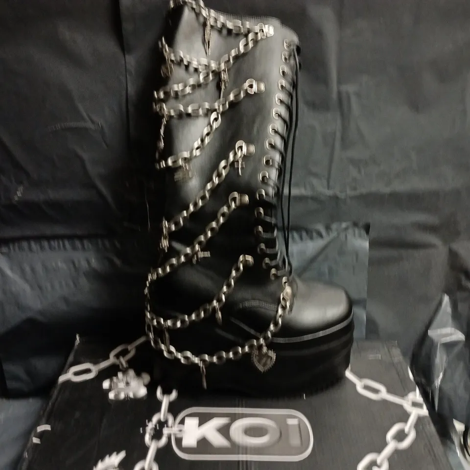 KOI BLACK CHAIN-EMBELLISHED PLATFORM BOOTS – SIZE 5