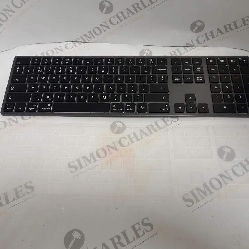 BOXED JELLY COMB WIRELESS KEYBOARD.