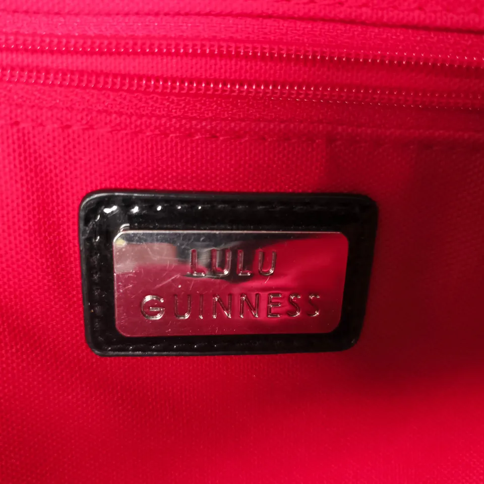 LULU GUINNESS HANDBAG – STOREFRONT PRINT, BLACK EXTERIOR WITH RED LINING