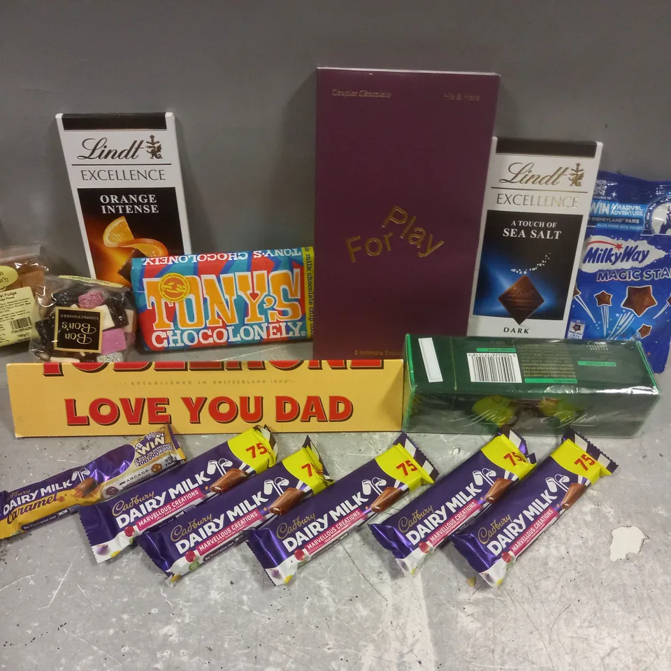 LARGE QUANTITY OF ASSORTED CONFECTIONARY TO INCLUDE; TERRY'S CHOCOLATE ORANGE, DAIRY MILK MARVELOUS CREAIONS, MILKY WAY MAGIC STARS, LINDT AND TONY'S CHOCOLONEY