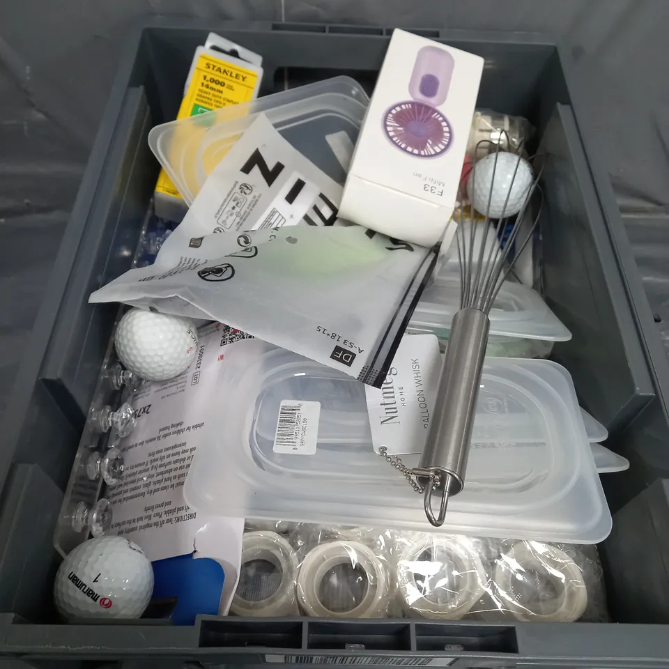 APPROXIMATELY 10 ASSORTED HOUSEHOLD ITEMS TOO INCLUDE GOLF BALLS , MINI FAN , TUB LIDS , ETC 