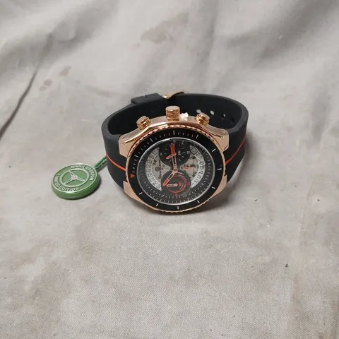 WRISTWATCH WITH ROSE-GOLD TONE CASE AND BLACK RUBBER STRAP โ BOXED (MANN EGERTON)