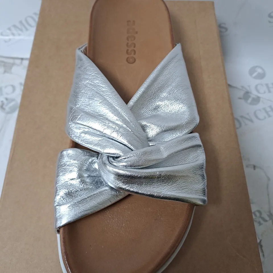 boxed ADESSO sandles in sliver size 7 