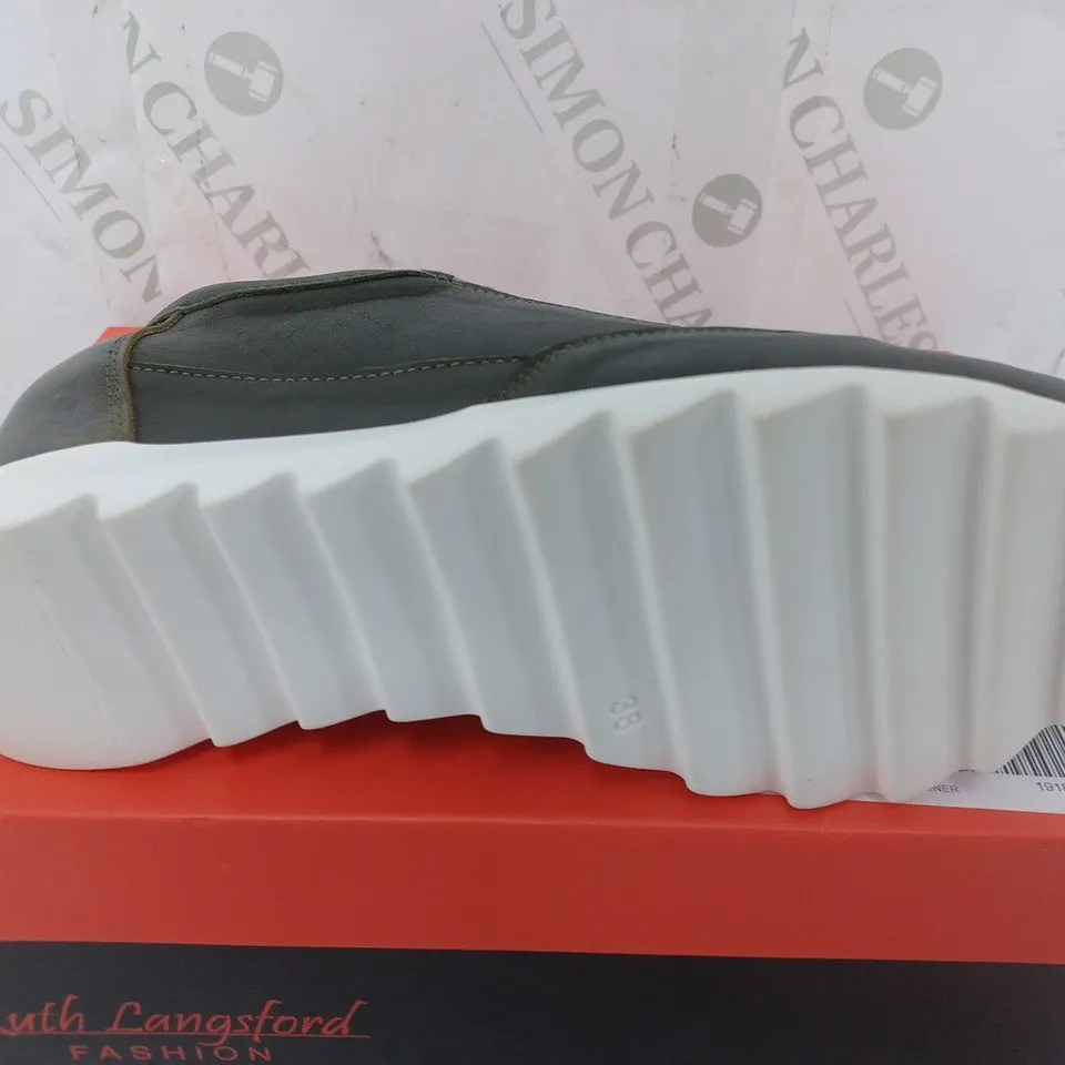 RUTH LANGSFORD WEDGE TRAINER IN KHAKI - SIZE 5