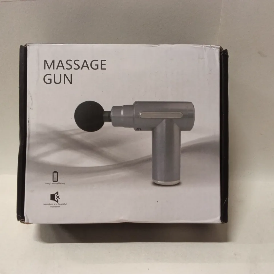MASSAGE GUN WITH FOUR MASSAGE HEADS – USB RECHARGEABLE