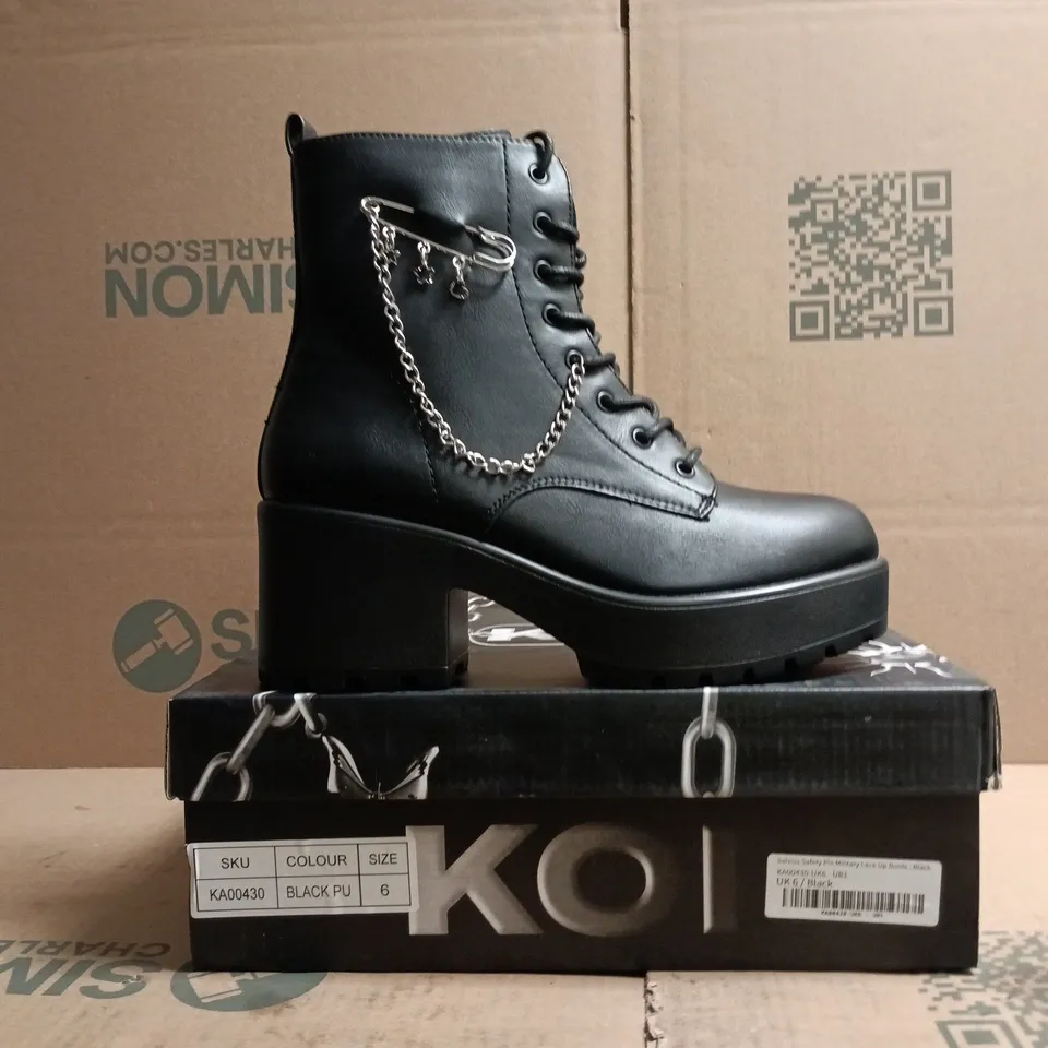 BOXED PAIR OF KOI SALVIUS SAFETY PIN MILITARY LACE UP BOOTS IN BLACK SIZE UK 6