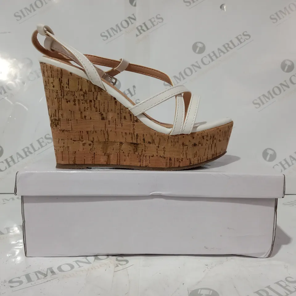 BOXED PAIR OF KRUSH OPEN TOE STRAPPY WEDGE HEEL SANDALS IN WHITE SIZE 4