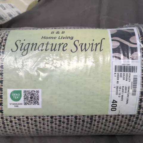B&B HOME LIVING SIGNATURE SWIRL RUG – ROLLED, IN PACKAGING
