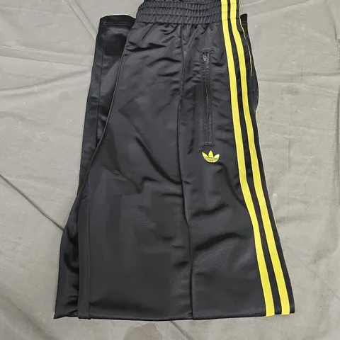 ADIDAS FIREBIRD TRACK PANTS - BLACK WITH YELLOW STRIPES (MEN'S) - UK SMALL 8-10
