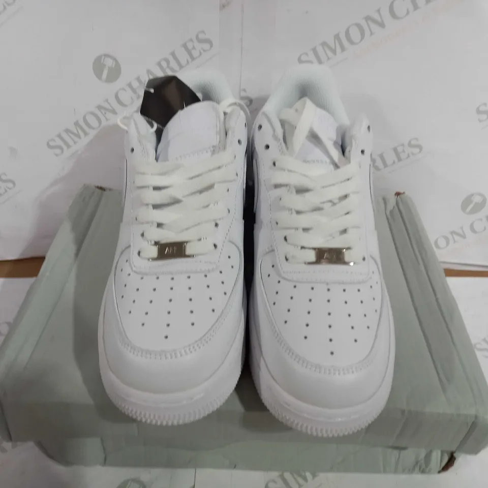 BOXED PAIR OF NIKE AIR FORCE LOWS IN WHITE - UK 7