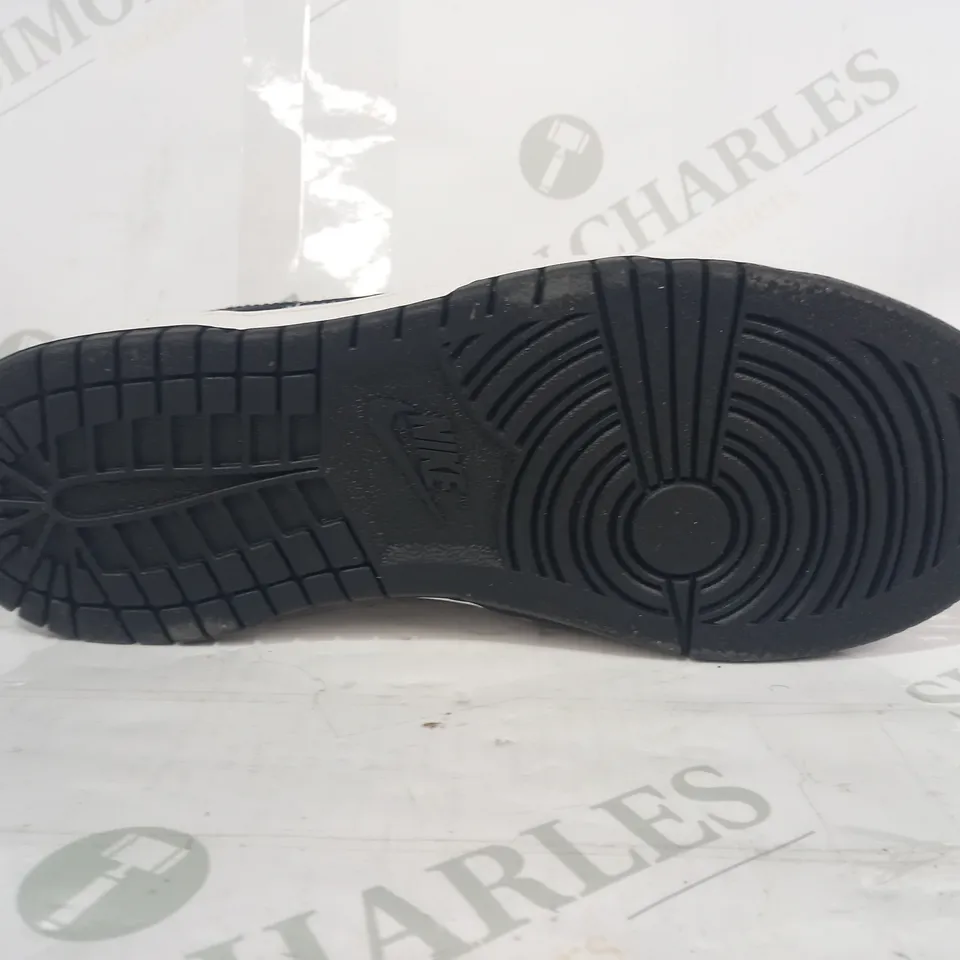 PAIR OF NIKE TRAINERS IN BLACK/WHITE UK SIZE 1