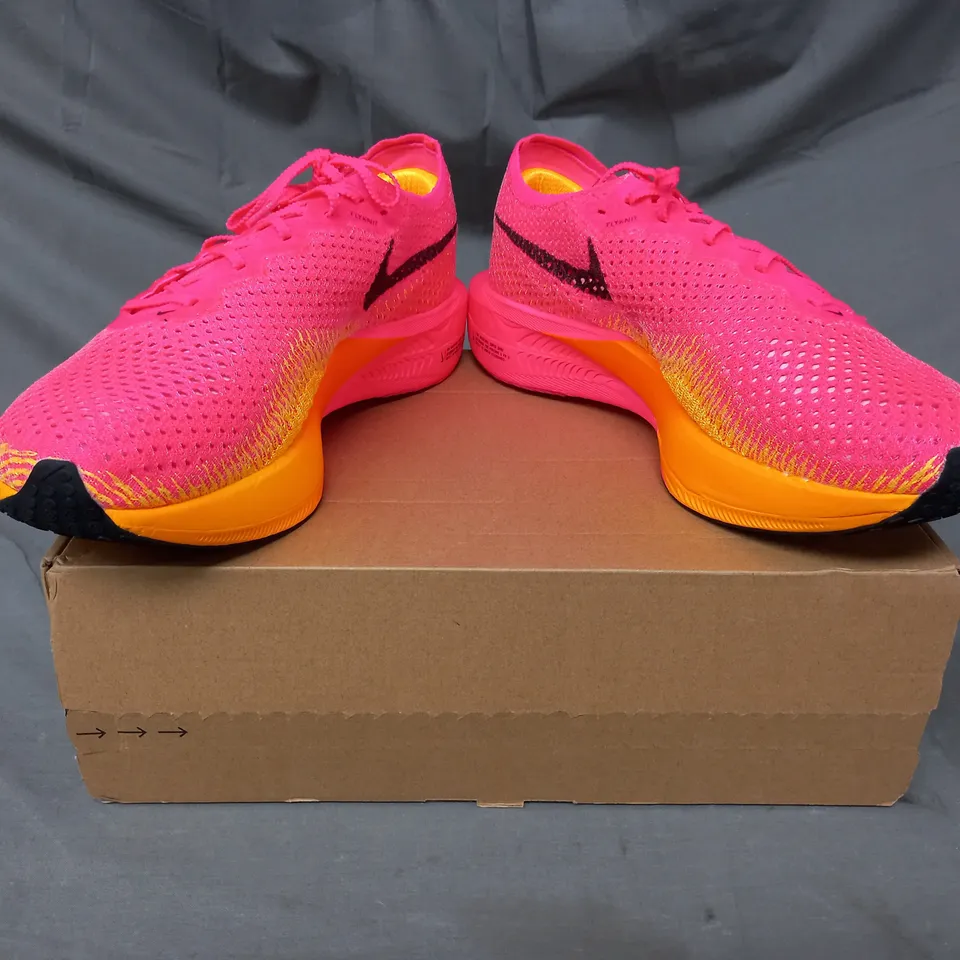 BOXED PAIR OF NIKE ZOOMX VAPORFLY SHOES IN PINK/ORANGE UK SIZE 9