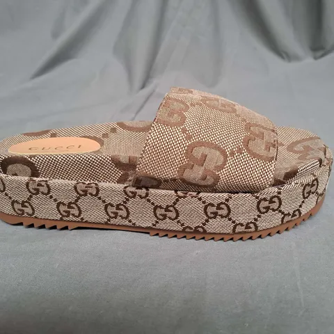 PAIR OF GUCCI PLATFORM SLIDES IN BROWN SIZE 38