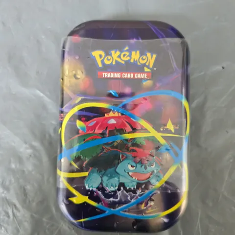 POKÉMON TRADING CARD GAME MEGA EVOLUTION TIN – BOOSTER PACK INCLUDED