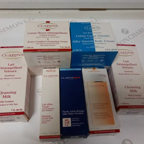 7 ASSORTED CLARINS PARIS PRODUCTS TO INCLUDE; CLEANSINNG MILK, EXTRA COMFORT CLEANSING CREAM, SILKY SMOOTH BODY CREAM, DAILY ENERGIZER WAKE UP BOOSTER, AFTER SHAVE SOOTHER AND SHAPING FACIAL LIFT