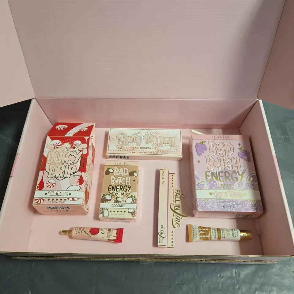 BOX OF 7 ASSORTED PLOUISE COSMETICS TO INCLUDE - FLUFFY FANTASY PALETTE - JUICY DRIP LIP DUO - COSMETIC BASE IN DAQUIRI DIVA - ETC