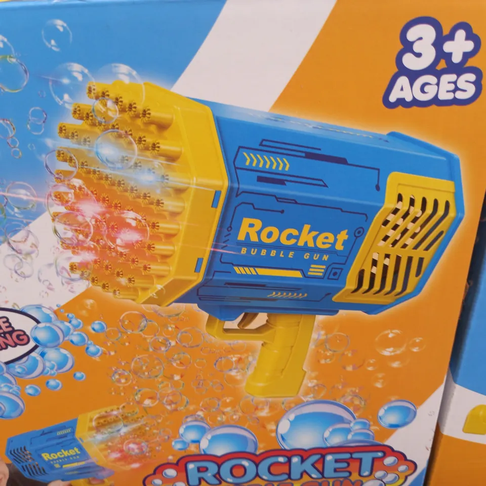 LOT OF 4 BOXED ROCKET BUBBLE GUNS