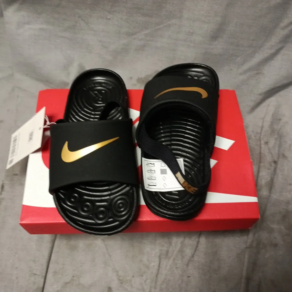 BOXED NIKE KAWA SLIDE IN BLACK/METALLIC GOLD, UK 9.5