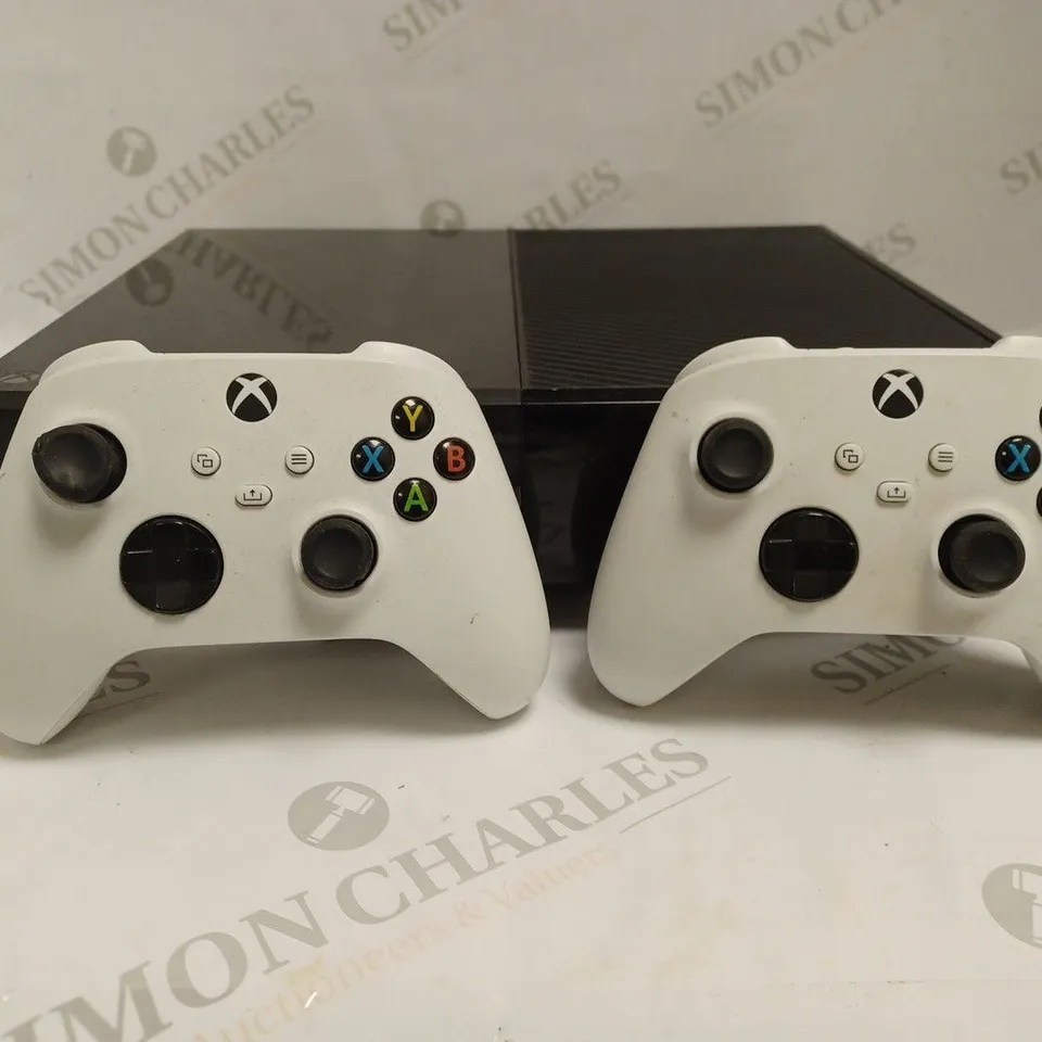 XBOX ONE CONSOLE - BLACK,  WITH 2 CONTROLLERS - WHITE. 