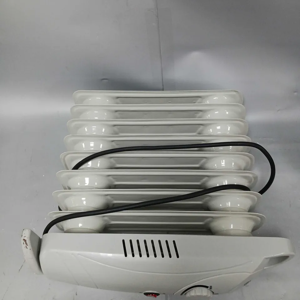 BOXED SWAN 1000W MINI OIL HEATER - WHITE RRP £29