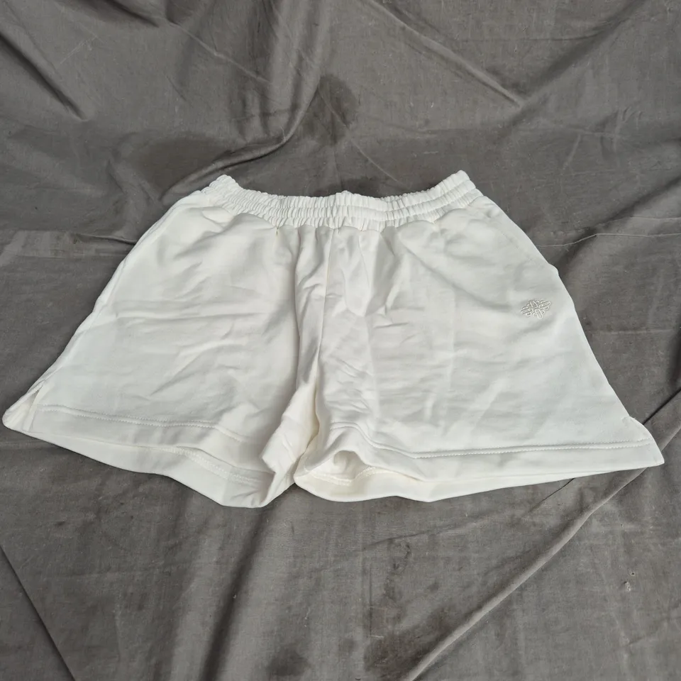 THE COUTURE CLUB MINIMAL EMBLEM BOYFRIEND SHORTS IN OFF WHITE SIZE 8