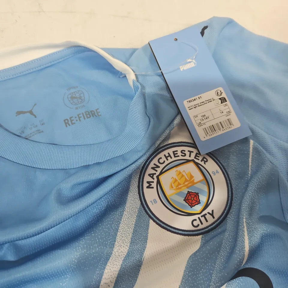 MCFC HOME JERSEY REPLICA IN LIGHT BLUE - UK 13/14 YRS JUNIOUR