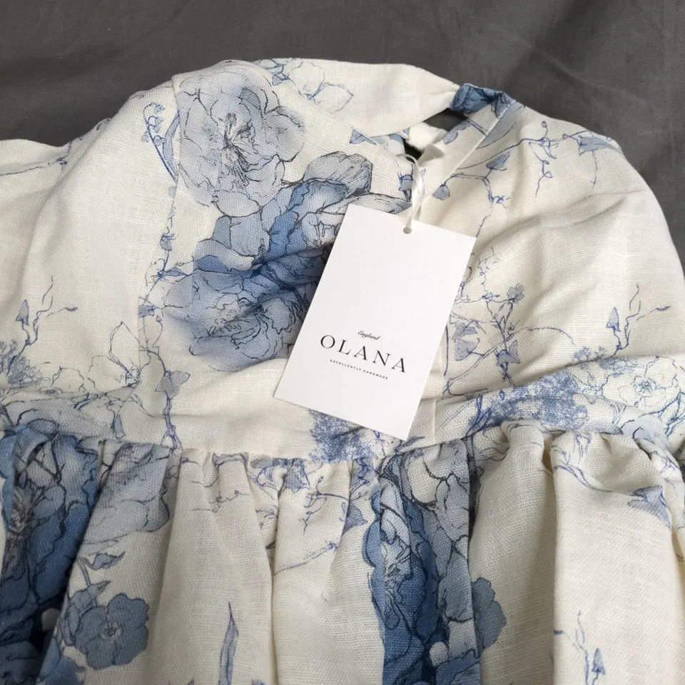OLANA BABY DRESS – BLUE FLORAL PRINT ON CREAM FABRIC - SIZE12