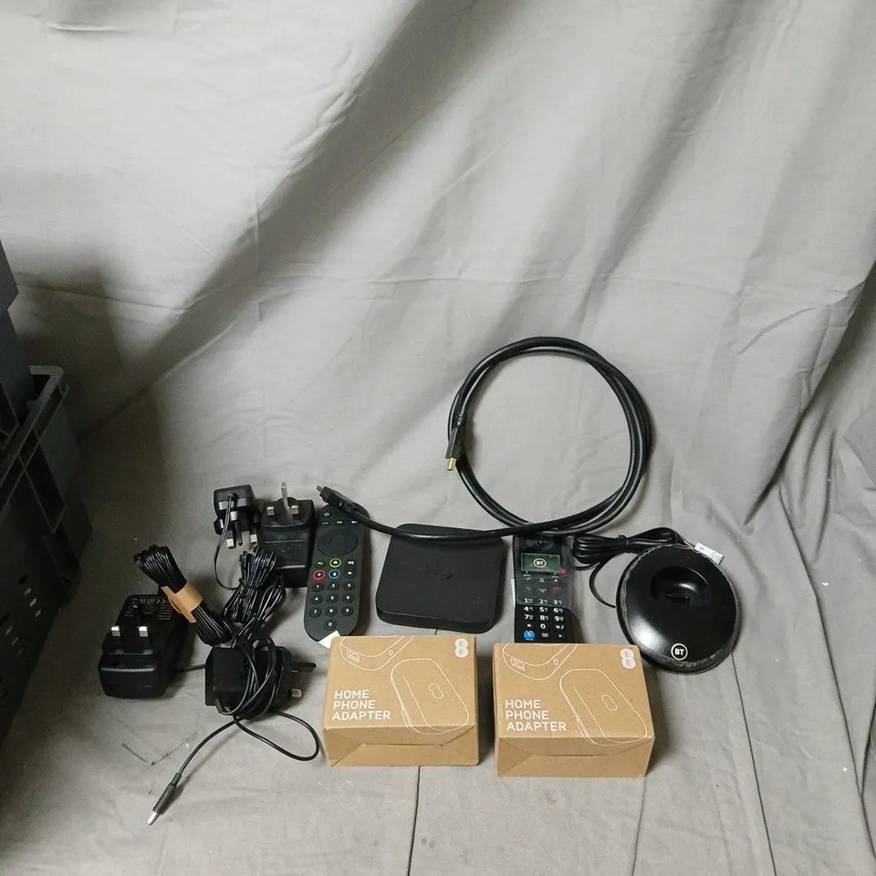HOME PHONE ADAPTERS & ACCESSORIES – CABLES, REMOTES & BOXED ADAPTERS BOX OF APPROXIMATELY 7 ITEMS .
