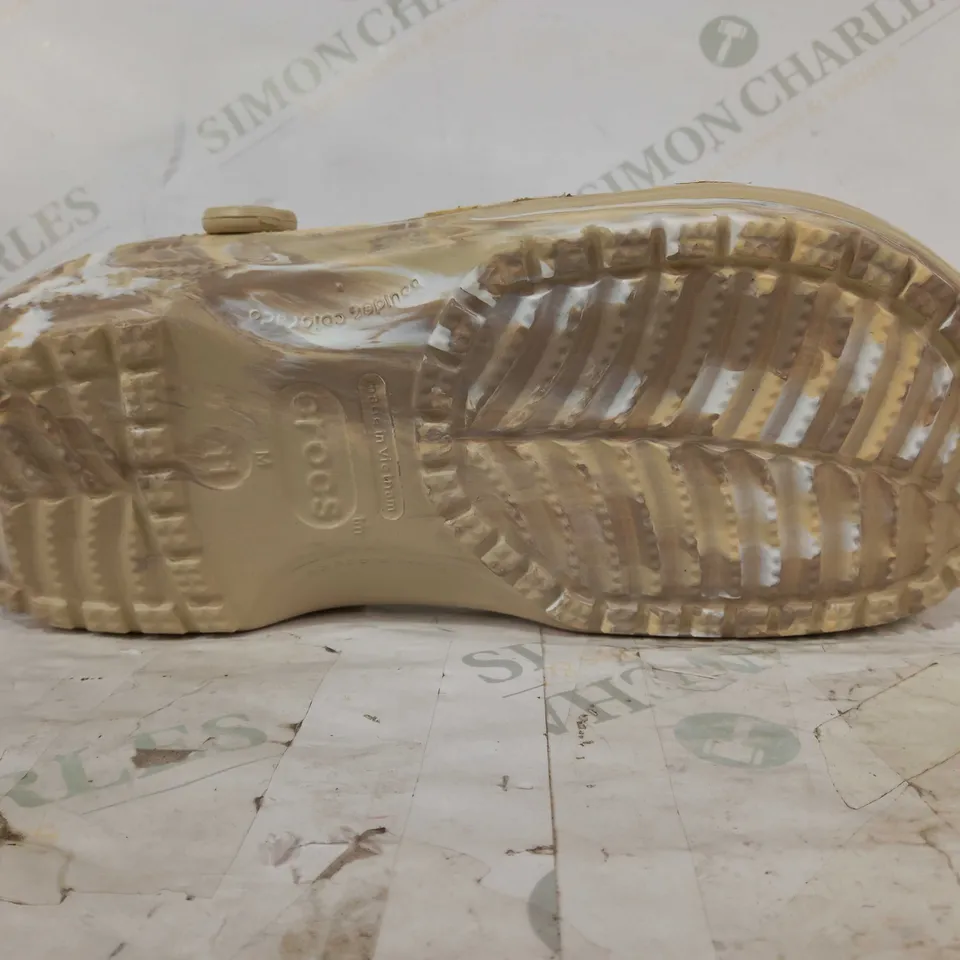 BOXED PAIR OF CROCS CLASSIC MARBLED CLOGS IN SAND COLOUR W. MINIONS CHARMS SIZE M11