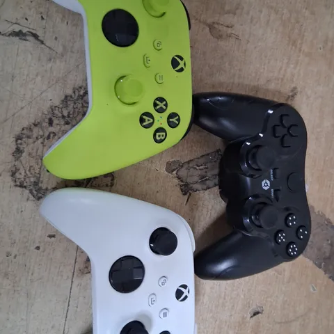 THREE ASSORTED GAMES CONSOLE CONTROLLERS TO INCLUDE; XBOX