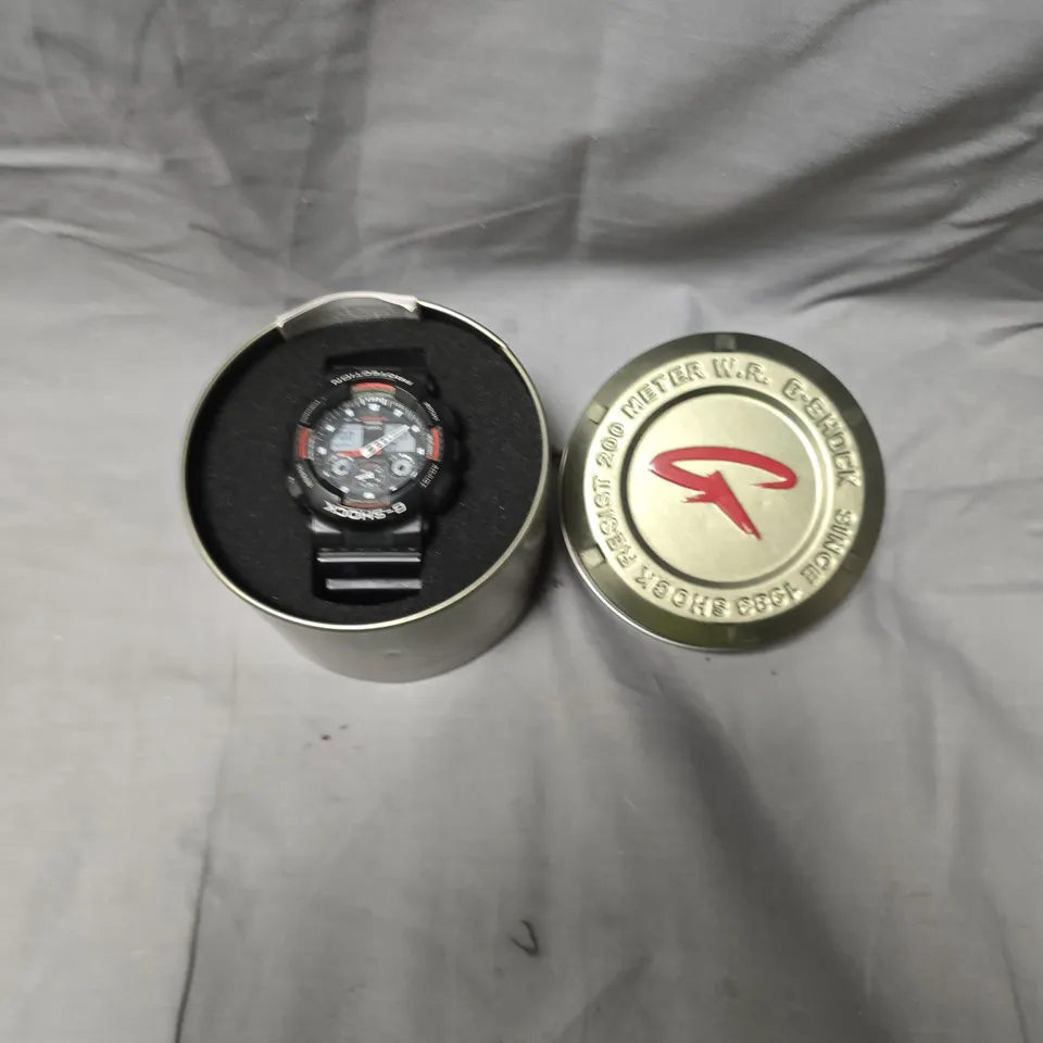 CASIO G-SHOCK BLACK SPORTS WATCH WITH RED ACCENTS – 200M WR, IN TIN BOX