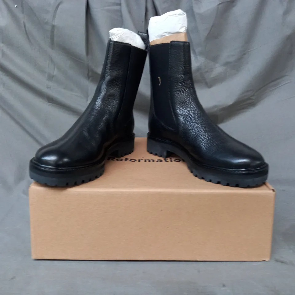 BOXED PAIR OF REFORMATION KATERINA LUG SOLE CHELSEA BOOTS IN BLACK SIZE 8