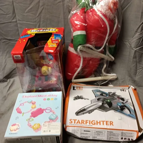 APPROXIMATELY 20 ASSORTED TOYS, GAMES, GIFTS AND NOVELTIES TO INCLUDE STARFIGHTER L25 FIGHTER TOY, ELEPHANT MUSICAL TOY, BOXING CLUB TOY, ETC - COLLECTION ONLY