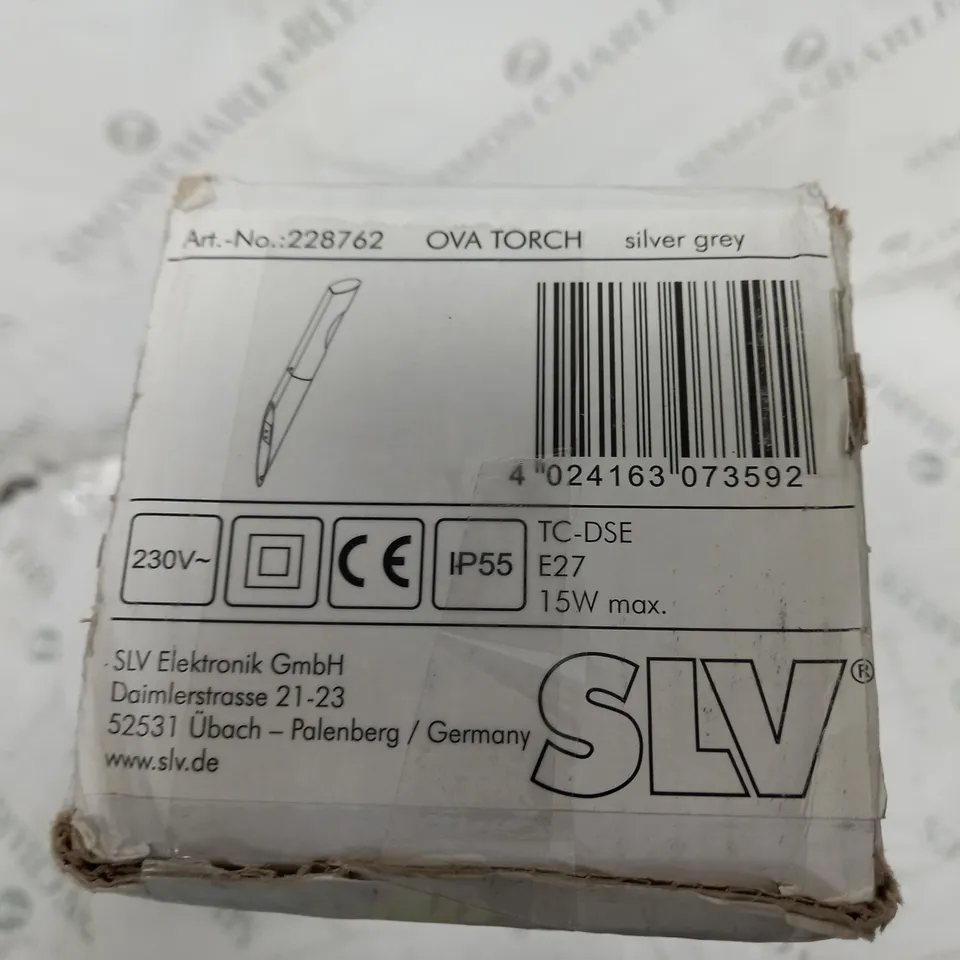 BOXED SLV OVA TORCH OUTDOOR WALL LIGHT IN SILVER/GREY