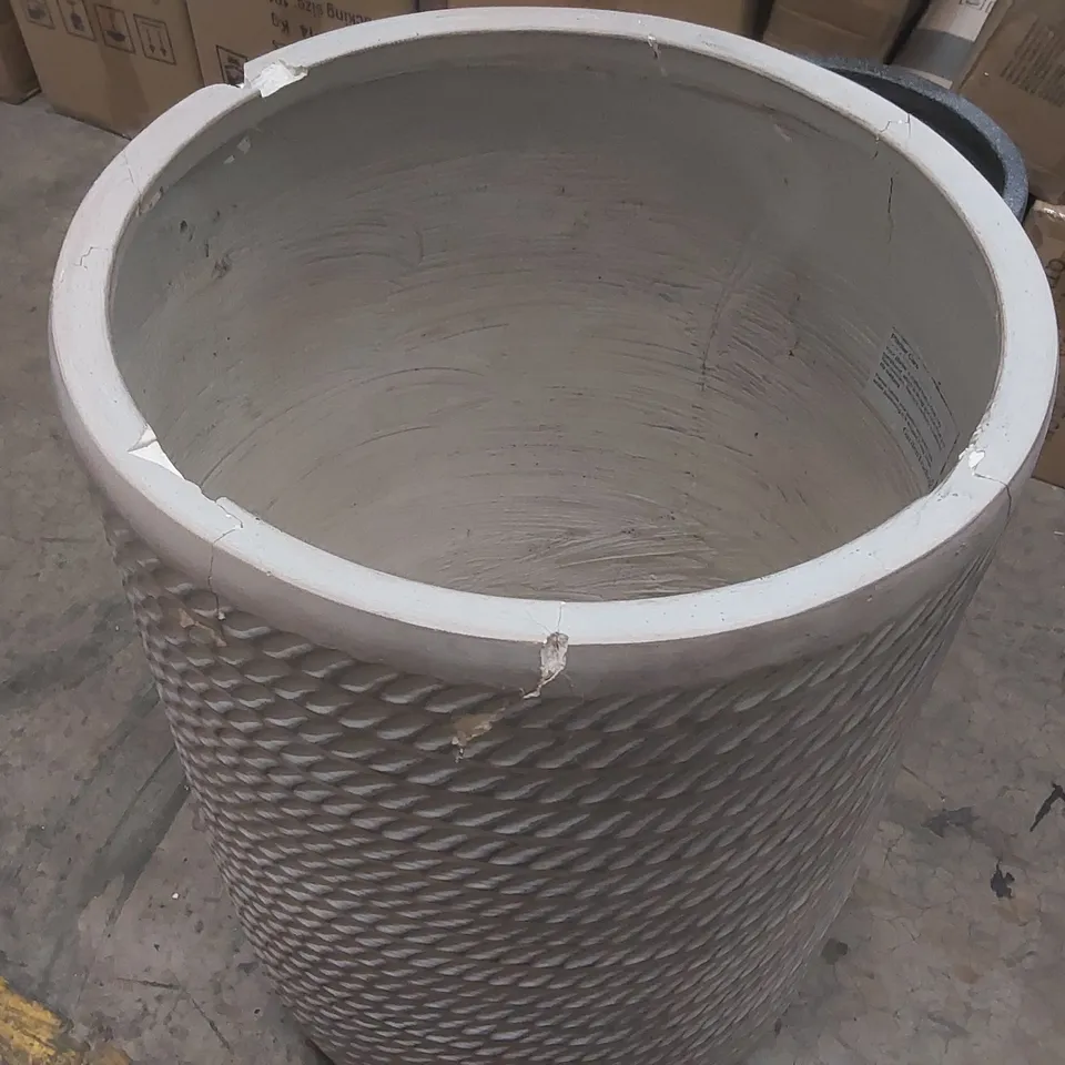 PAIR OF LARGE DESIGNER PLANTERS