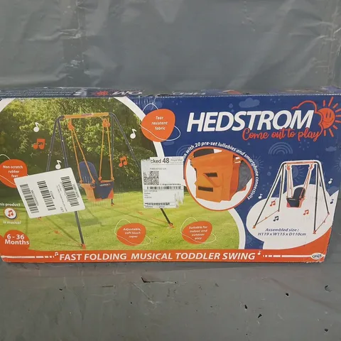 BOXED HEDSTROM FAST FOLDING MUSICAL TODDLER SWING