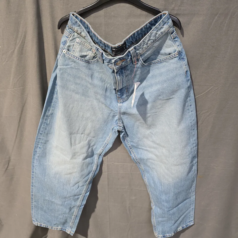 BOX OF APPROXIMATELY 25 CLOTHING ITEMS INCLUDING: BLACK SKIRT, BLUE ASOS JEANS AND BROWN NEXT BARREL LEG PANTS