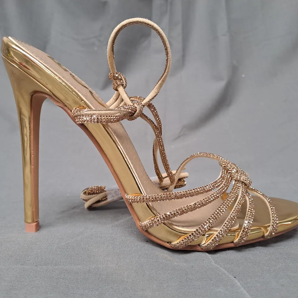 BOXED PAIR OF EGO OPEN TOE STILETTO HEEL STRAPPY SANDALS IN METALLIC GOLD UK SIZE 6