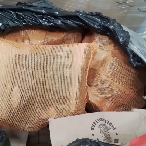 PALLET CONTAINING LARGE AMOUNT OF WOOD BBQ BRIQUETTES AND FURE LIGHTERS