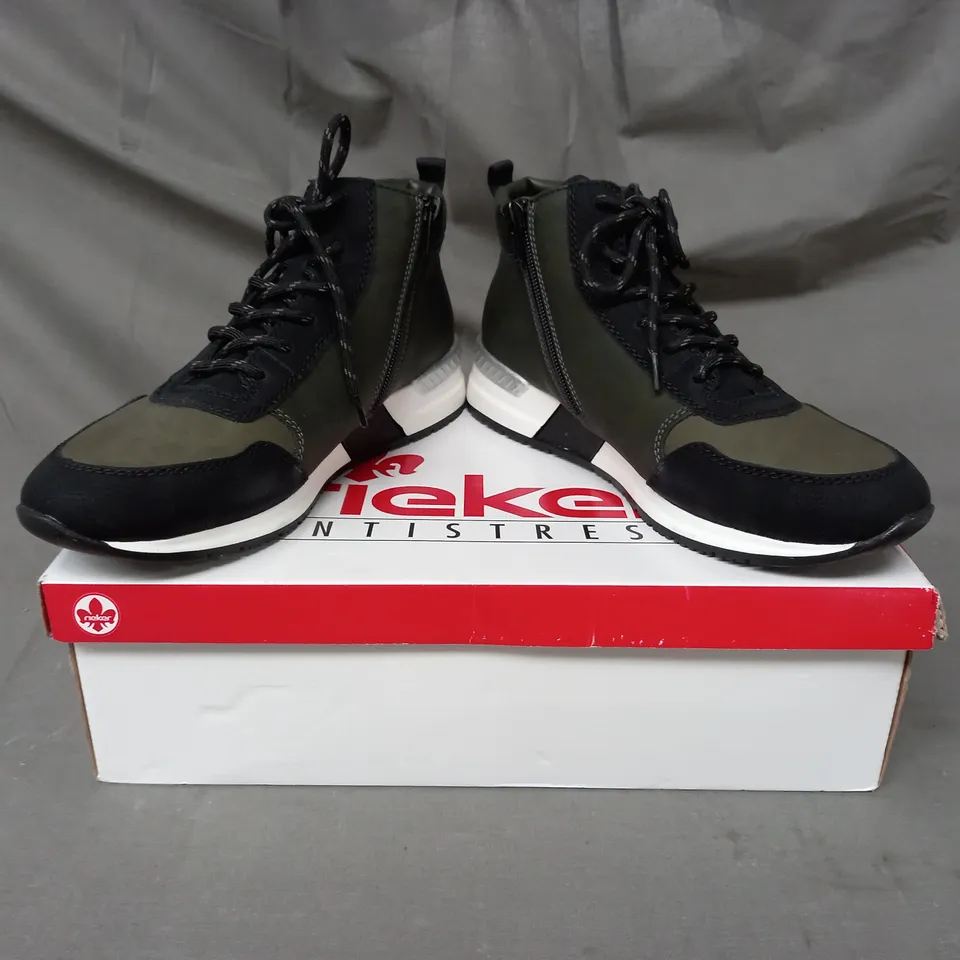 BOXED PAIR OF RIEKER HI TOP TRAINER BOOTS IN KHAKI SIZE 6