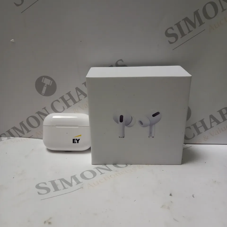 BOXED WIRELESS BLUETOOTH EARPHONES IN WHITE
