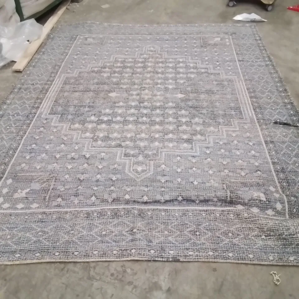 STILLAGE OF APPROXIMATELY 20 QUALITY DESIGNER RUGS
