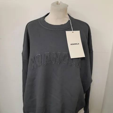 ADANOLA DISTRESSED VARSITY OVERSIZED SWEATSHIRT SIZE L