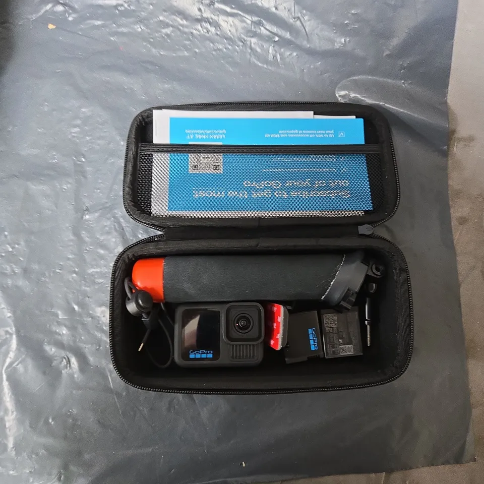 GOPRO ACTION CAMERA WITH ACCESSORY BUNDLE IN CARRY CASE