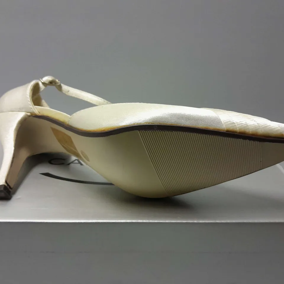 APPROXIMATELY 12 BOXED CASANDRA POINTED TOE HEELS IN IVORY IN VARIOUS SIZES