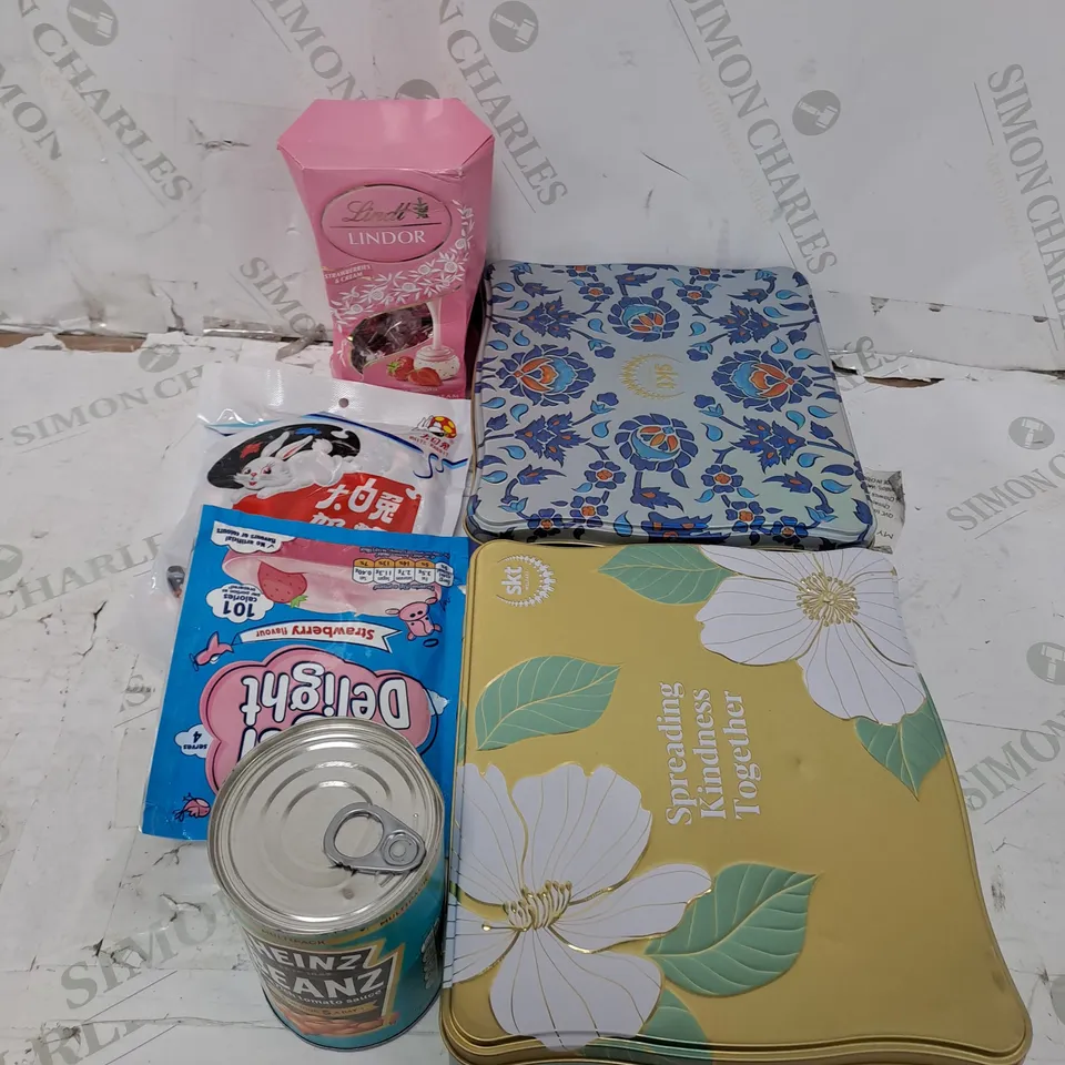 TOTE OF ASSORTED FOOD AND DRINK TOO INCLUDE BEANS , LINDOR , DATES , ETC 