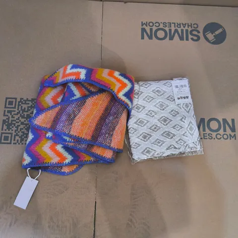 Box of assorted clothing items in various styles