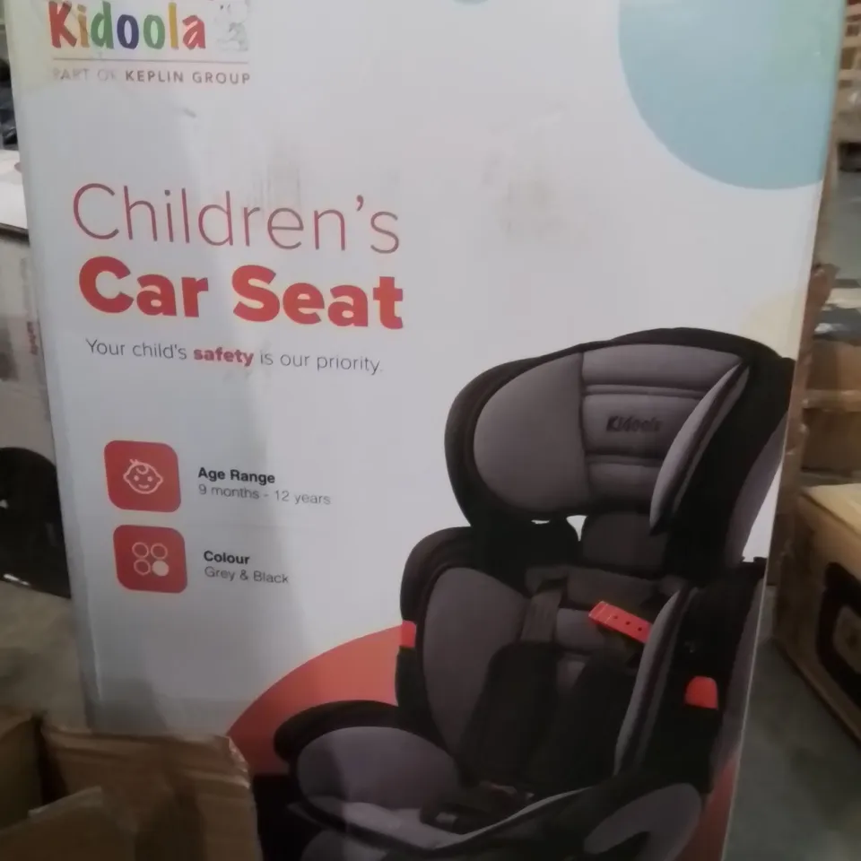 BOXED KIDOOLA CHILDREN'S CAR SEAT