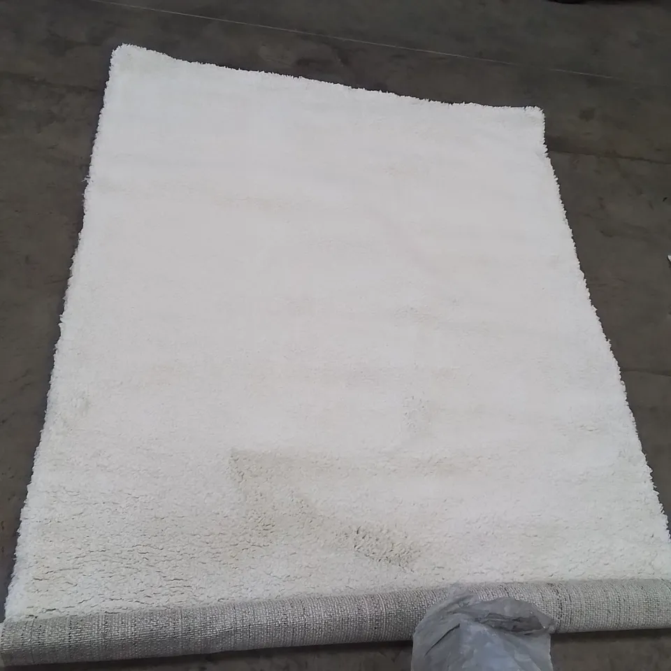 STILLAGE OF APPROXIMATELY 20 BAGGED QUALITY DESIGNER RUGS